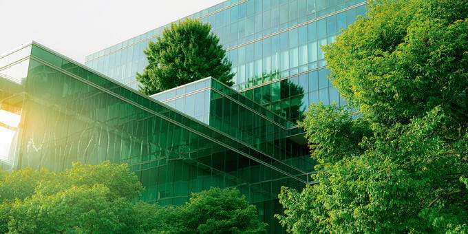 a building with trees in front of it