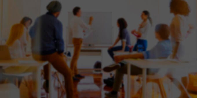 a group of people in a classroom