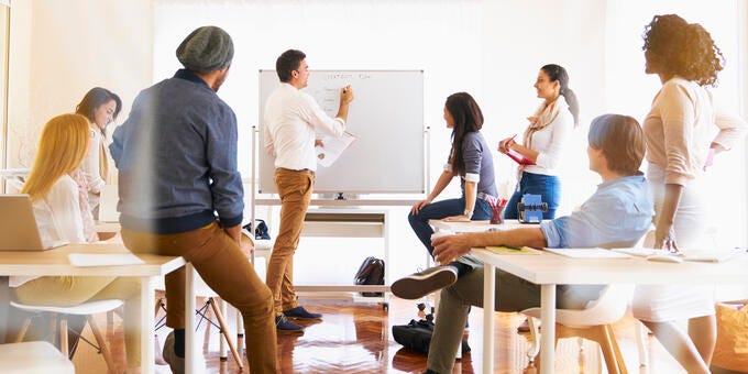 a group of people in a classroom