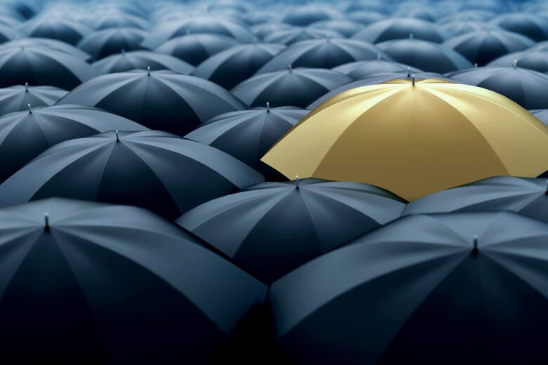 a yellow umbrella on a large white and blue background