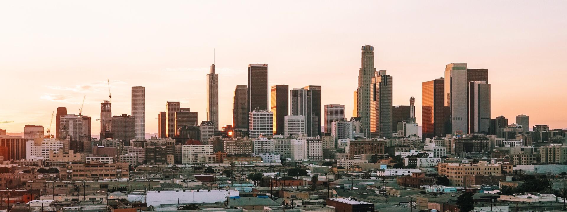 a city skyline with a river