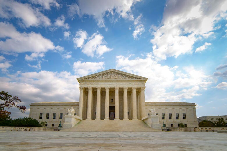 a large white building with columns