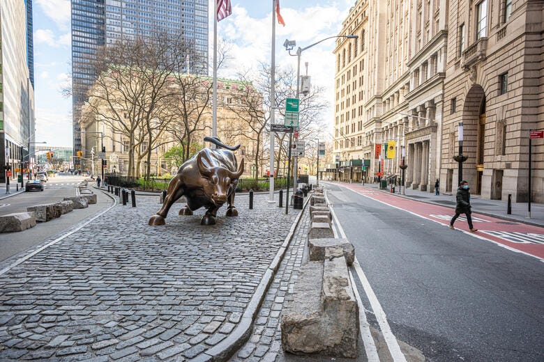 a statue of a horse on a sidewalk